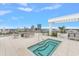 Inviting rooftop jacuzzi and lounge area with city views at 777 3Rd N Ave # 1304, St Petersburg, FL 33701