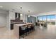 Open-concept kitchen with large island, modern appliances, and city views at 777 3Rd N Ave # 1304, St Petersburg, FL 33701