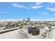 Comfortable rooftop lounge area with firepit and stunning city views at 777 3Rd N Ave # 1304, St Petersburg, FL 33701