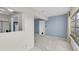 Bright living room with a view into the kitchen area, providing an open and inviting atmosphere for Gathering and guests at 8451 Candlewood Rd # 8451, Seminole, FL 33777