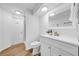 Bathroom featuring sleek vanity with matte black faucet and modern shower with decorative tile at 8537 93Rd Ave, Seminole, FL 33777