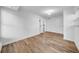Bright bedroom featuring wood floors, white walls and doors, and lots of natural light at 8537 93Rd Ave, Seminole, FL 33777