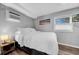 Cozy bedroom featuring natural light, wall art and hardwood floors at 8537 93Rd Ave, Seminole, FL 33777