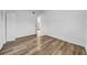 This bedroom features neutral walls, wood-look floors, a closet and natural light at 8537 93Rd Ave, Seminole, FL 33777