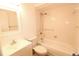 Bathroom featuring a shower-tub combo, vanity and toilet at 8807 Mary Ivy Dr, Plant City, FL 33567