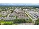 Aerial view of the townhome community surrounded by lush greenery at 1050 Starkey Rd # 704, Largo, FL 33771