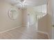 Spacious living room with light wood floors, neutral walls, and bright, natural light at 1050 Starkey Rd # 704, Largo, FL 33771