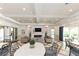 Upscale community clubhouse features a large fireplace, high ceilings, and designer furniture at 10520 Boardwalk Loop # 202, Bradenton, FL 34202