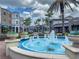 Charming community featuring a decorative fountain, palm trees, upscale shops and restaurants, and a vibrant atmosphere at 10520 Boardwalk Loop # 202, Bradenton, FL 34202