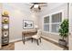 Cozy office space with natural light, built-in shelving, and desk, ideal for a productive work environment at 10520 Boardwalk Loop # 202, Bradenton, FL 34202