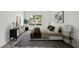 Stylishly furnished bedroom featuring modern decor, neutral tones, and a comfortable queen-sized bed at 11799 Raintree Dr, Temple Terrace, FL 33617