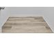 Laminate flooring with white trim at 11799 Raintree Dr, Temple Terrace, FL 33617