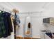 Spacious walk-in closet with organized shelving and ample storage space for clothing and accessories at 12031 Mountbatten Dr, Tampa, FL 33626