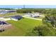 New construction features a modern house with a landscaped yard at 14080 Sydney Rd, Dover, FL 33527