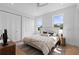 Bright bedroom with a comfortable bed, neutral decor, and plenty of natural light at 1500 49Th N St, St Petersburg, FL 33710