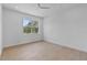 Bright and airy bedroom with hardwood floors and a large window at 1500 49Th N St, St Petersburg, FL 33710