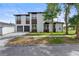 Stunning two-story modern home with a well-manicured lawn and two-car garage at 1500 49Th N St, St Petersburg, FL 33710
