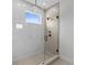 Contemporary glass shower with sleek fixtures and tiled walls at 1500 49Th N St, St Petersburg, FL 33710