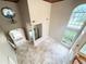 Bright foyer with high ceilings, a stained glass window, and large windows offering plenty of natural light at 16006 Armistead Ln, Odessa, FL 33556
