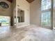 Bright living room offering lots of natural light through large windows showcasing the outside scenery at 16006 Armistead Ln, Odessa, FL 33556