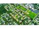 Aerial view of the neighborhood highlighting proximity to sports fields and recreational areas at 1701 Pinehurst Rd # 33E, Dunedin, FL 34698