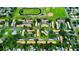 Aerial view of the neighborhood highlighting proximity to sports fields and recreational areas at 1701 Pinehurst Rd # 33E, Dunedin, FL 34698