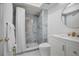 Modern bathroom featuring a stylish shower stall with sleek vanity, gold faucet and towel rack at 1701 Pinehurst Rd # 33E, Dunedin, FL 34698