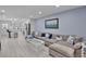 Open living space with modern kitchen, comfortable seating, and stylish decor at 1701 Pinehurst Rd # 33E, Dunedin, FL 34698