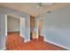 Bright living room featuring hardwood floors and a ceiling fan at 1717 Atrium Dr, Sun City Center, FL 33573