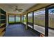 Enclosed sunroom with views of the outdoors at 1717 Atrium Dr, Sun City Center, FL 33573