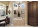 Inviting bathtub with a charming chandelier and views at 18521 Wayne Rd, Odessa, FL 33556