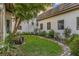 Private courtyard with lush garden, ideal for relaxation at 18521 Wayne Rd, Odessa, FL 33556