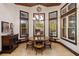Charming dining room with bay windows offers scenic outdoor views at 18521 Wayne Rd, Odessa, FL 33556