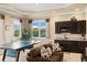 Game room with a ping pong table, and seating, plus a snack bar with a sink at 18521 Wayne Rd, Odessa, FL 33556