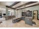 Expansive kitchen features granite counters, large island, and coffered ceiling at 18521 Wayne Rd, Odessa, FL 33556