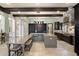Gourmet kitchen boasts a large island, modern appliances, and stone accents at 18521 Wayne Rd, Odessa, FL 33556