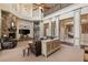 Spacious living room with fireplace, tall ceilings, and dining room view at 18521 Wayne Rd, Odessa, FL 33556