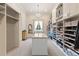 Large walk-in closet with ample storage space and natural light at 18521 Wayne Rd, Odessa, FL 33556