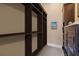 Custom walk-in closet with built-in shelving and storage at 18521 Wayne Rd, Odessa, FL 33556