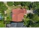 The bird's eye view of the property highlights mature trees, large backyard and proximity to the neighborhood at 19206 Ivy Oak Way, Tampa, FL 33647