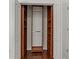 Walk-in closet featuring custom wood shelving and rods at 19206 Ivy Oak Way, Tampa, FL 33647