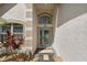 Inviting front entrance with stone accents and a decorative glass door at 19206 Ivy Oak Way, Tampa, FL 33647
