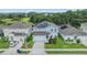 Eye-catching home with solar panels, lush landscaping, and a well-kept lawn in a quiet neighborhood at 2073 Branding Iron Way, New Port Richey, FL 34655