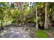 Backyard exercise area nestled amongst beautiful foliage at 22442 Vale Ave, Punta Gorda, FL 33980