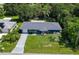 Charming single-story home features a well-manicured lawn and a private driveway at 22442 Vale Ave, Punta Gorda, FL 33980