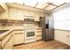 A clean kitchen with stainless steel refrigerator at 2400 Winding Creek Blvd # Bldg18A210, Clearwater, FL 33761