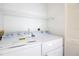 Laundry room with new, front loading washer and dryer at 2400 Winding Creek Blvd # Bldg18A210, Clearwater, FL 33761