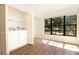 A bright laundry room with newer washer and dryer machines at 2400 Winding Creek Blvd # Bldg18A210, Clearwater, FL 33761
