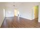 Open-concept living area with wood floors, a ceiling fan, and ample space for entertaining at 2400 Winding Creek Blvd # Bldg18A210, Clearwater, FL 33761