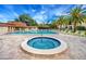 Relaxing community hot tub next to the beautiful swimming pool, perfect for enjoying the sunny weather at 2400 Winding Creek Blvd # Bldg18A210, Clearwater, FL 33761